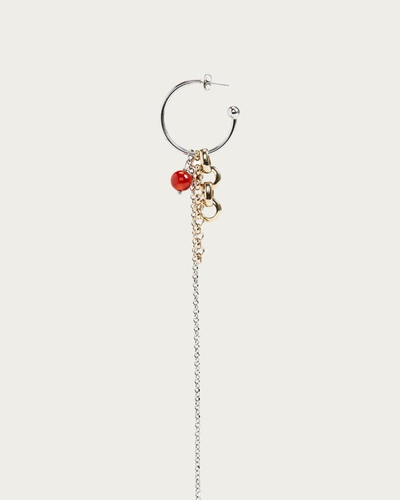 Front of a size O/S Terry Earring in Silver/Pale Gold in Silver/Pale Gold by JUSTINE CLENQUET. | dia_product_style_image_id:331476